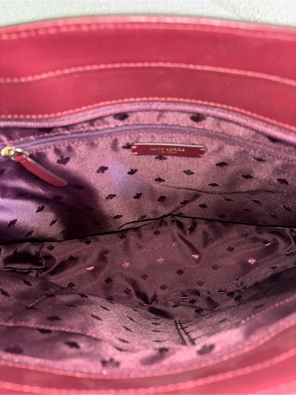 kate spade Burgundy Leather Tote with Floral Charm